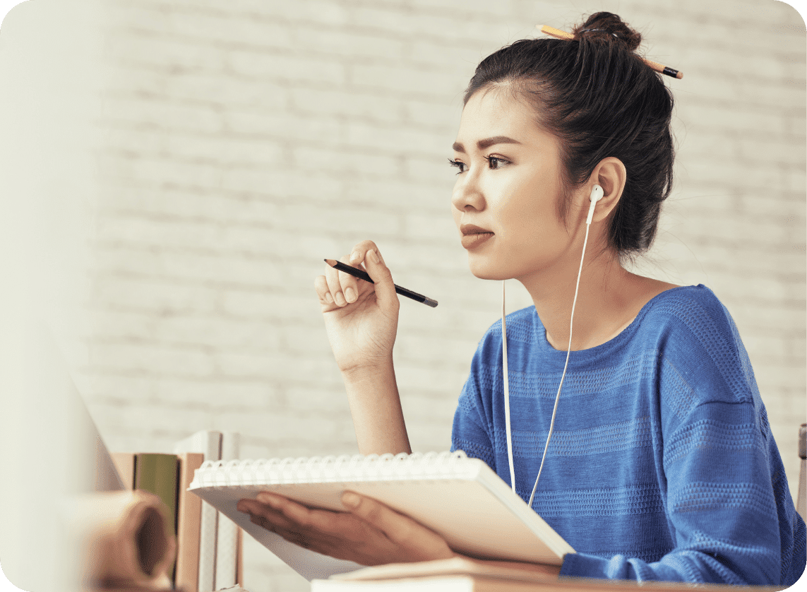 Young woman working on notepad